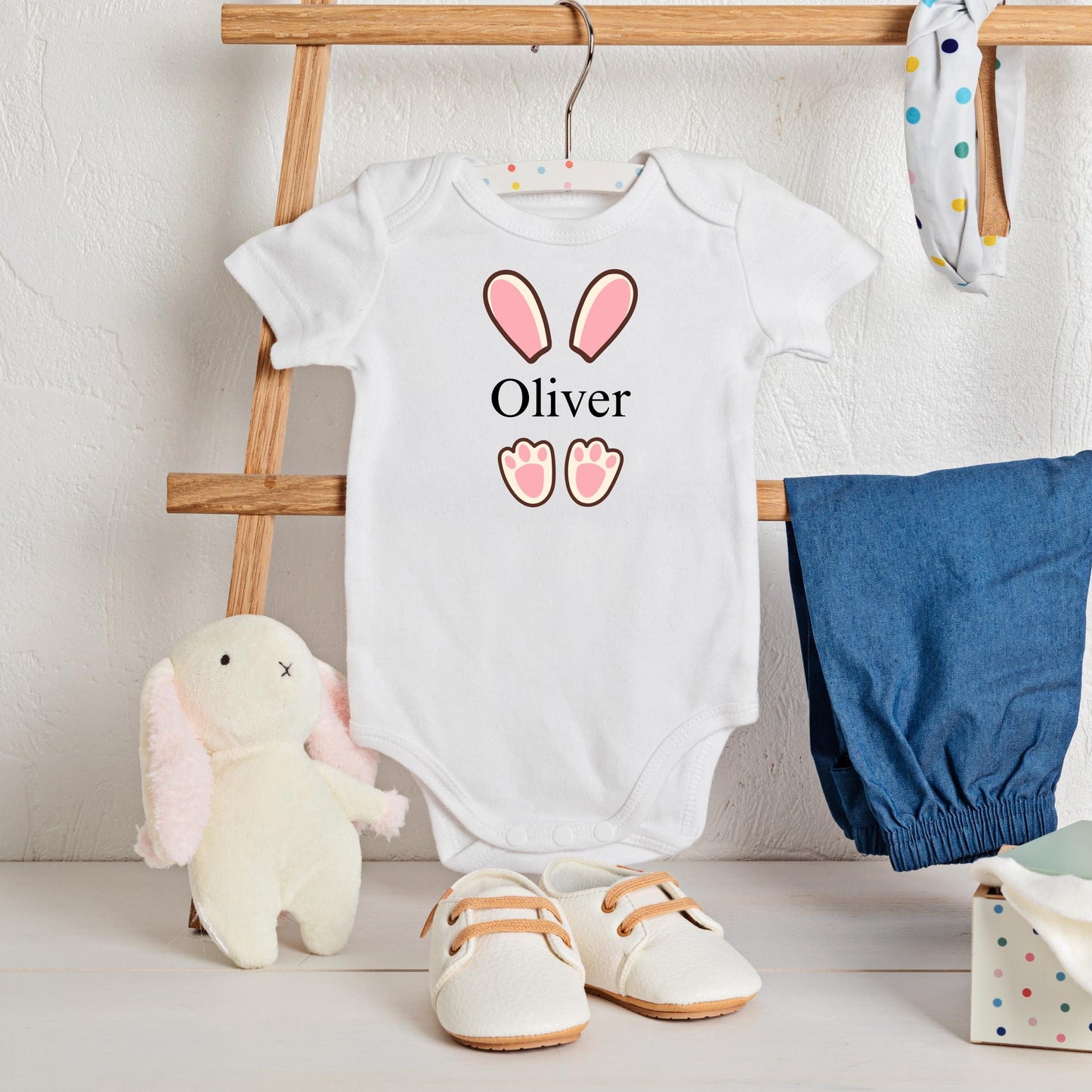 baby first Easter bodysuit with bunny ears and personalized name. what a perfect way to celebrate this Easter holiday